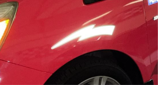 Reflective fender lighting bolts